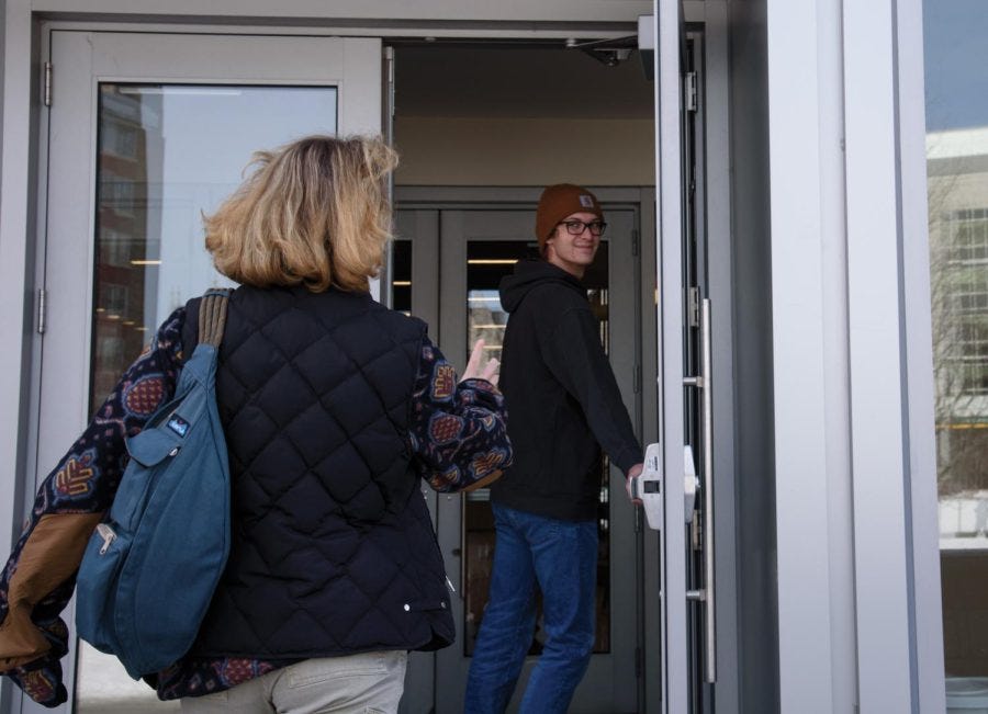 Photo+Illustration%3A+Students+holding+the+door+for+each+other+at+Innovation+Hall.+On+the+topic+of+door-holding%2C+anthropology+professor+Luis+Vivanco+said+%E2%80%9Cthere+are+all+kinds+of+interpersonal+politics+that+go+into+holding+the+door.%E2%80%9D