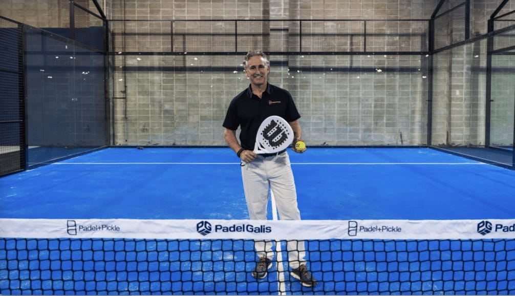 Padel + Pickle founder Mike Puertas on a padel court Padel + Pickle founder Mike Puertas on a padel court