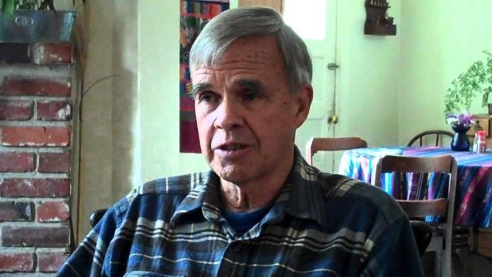 A person sitting in a chair

Description automatically generated