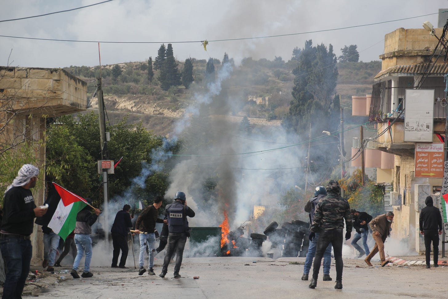 West Bank: Israeli army fire teargas at Palestinians as settlers march on  village | Middle East Eye