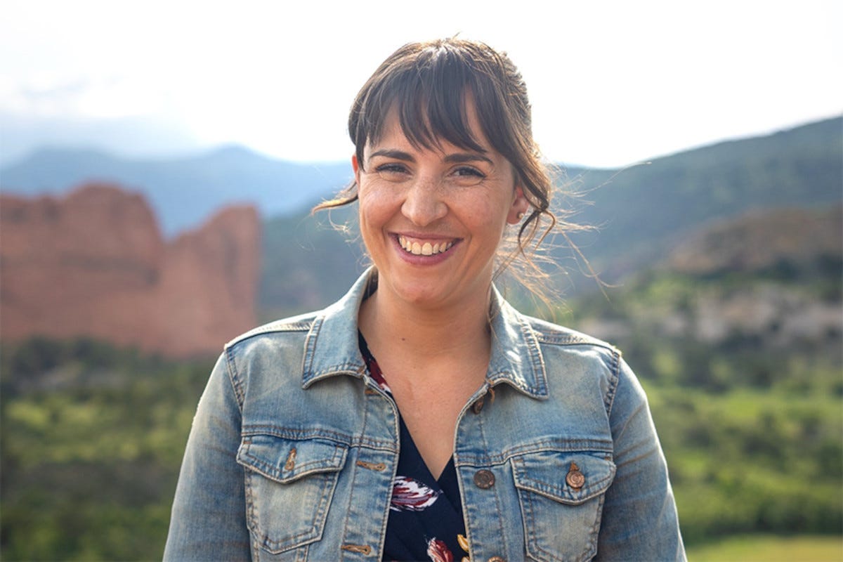 Woman outdoors wearing a denim jacket Woman outdoors wearing a denim jacket