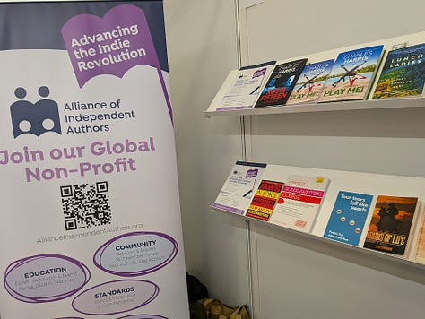 3 photos: A wide shot of the exhibition, picture of Adukeh, a picture of a book stand at the fair.