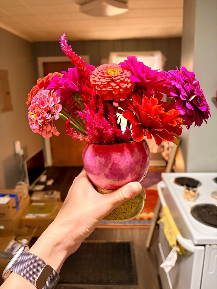 Rotating bouquet of Columbine, cock's comb, and sunflowers from the Lawrence Farmer's Market — redirecting sensual energy into flowers.