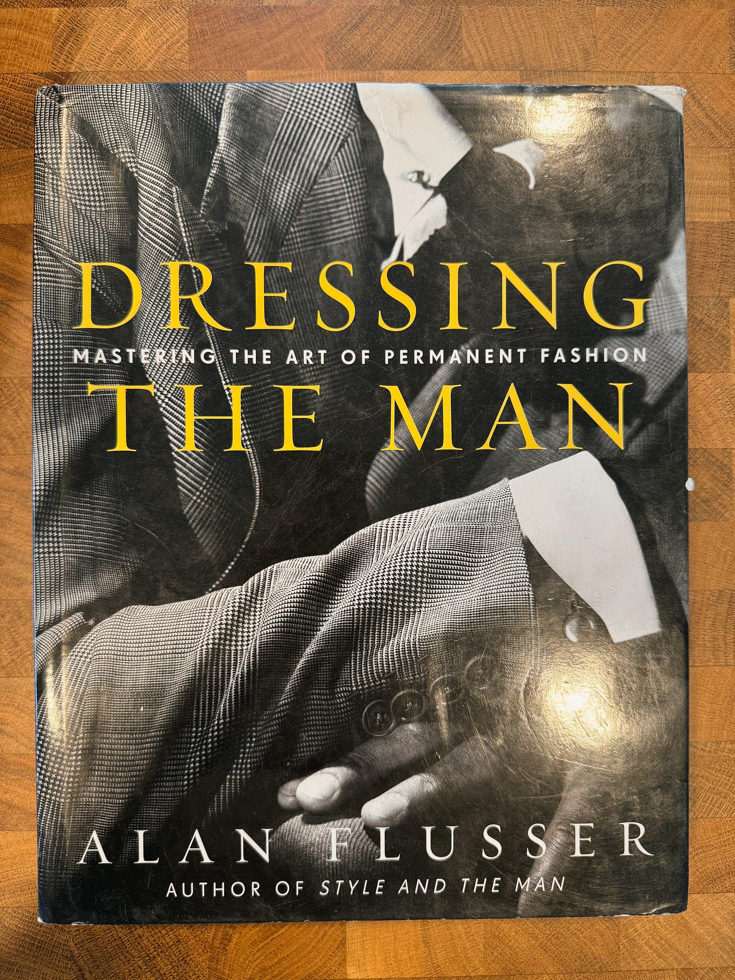 dressing the man: mastering the art of permanent fashion Dressing the Man: Mastering the Art of Permanent Fashion by Alan Fluss main image 0