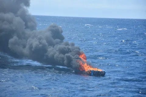 his cartel cocaine smuggling boat was set afire by the US Coast Guard after its drugs & crew were seized on August 16, 2025.