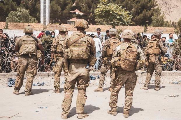 Reports: At Least 13 US Service Members Dead After Two Bombs Are Detonated Next to Kabul Airport | Military.com Reports: At Least 13 US Service Members Dead After Two Bombs Are Detonated Next to Kabul Airport | Military.com