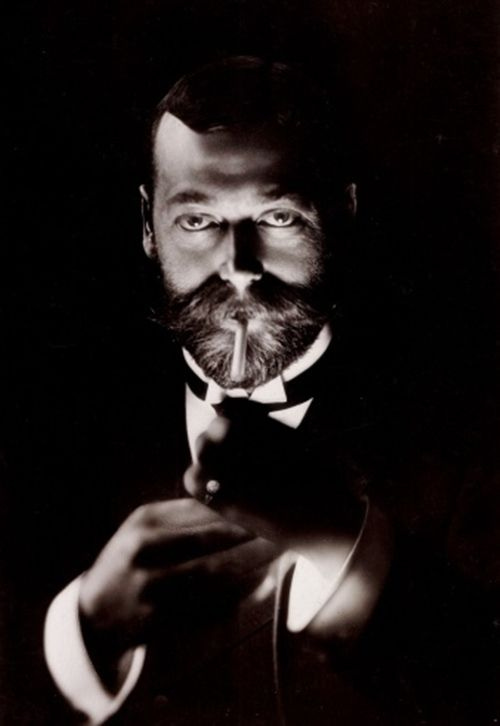 George V smoking in portraits and candidly