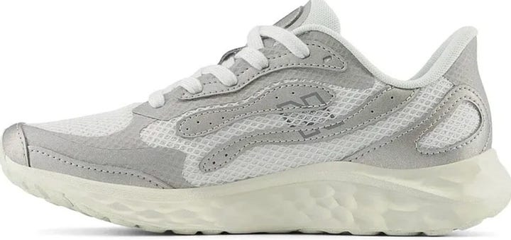 A purple floral dress, a woman wearing a white shirt, grey sneakers, and a white tote bag.