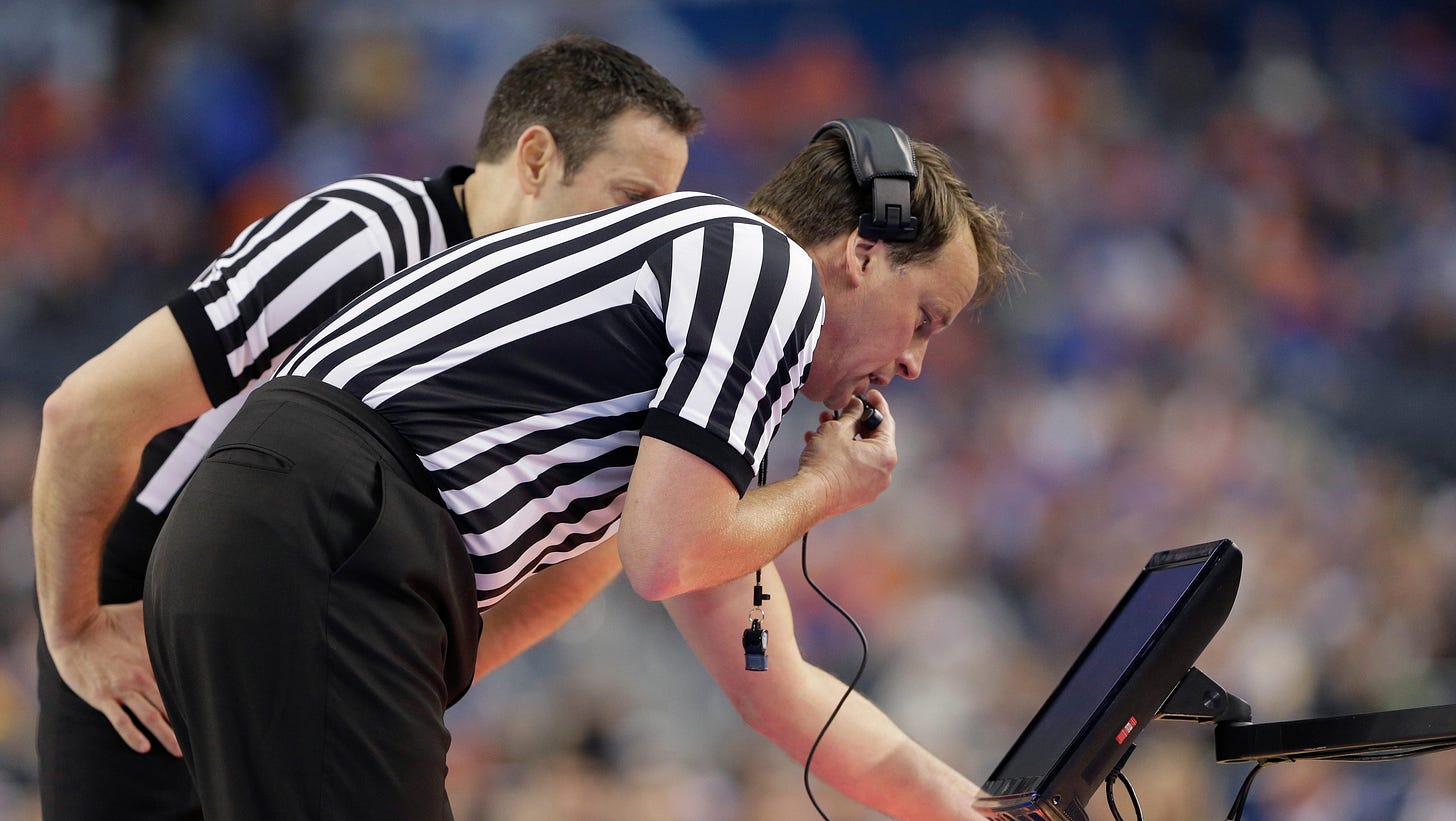 Video replay transforms end of NCAA basketball games into marathon