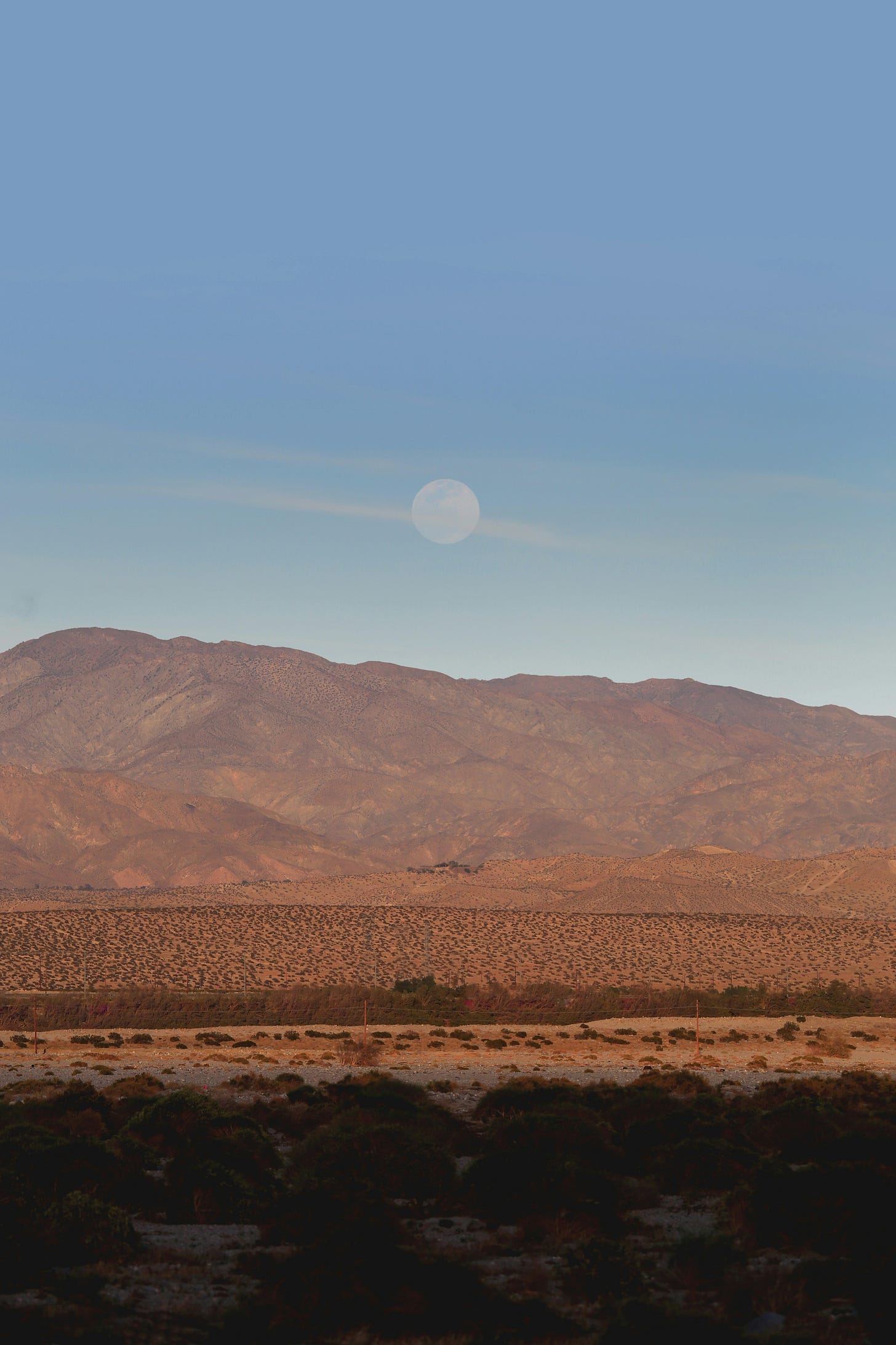 brown mountains under blue sky during daytime