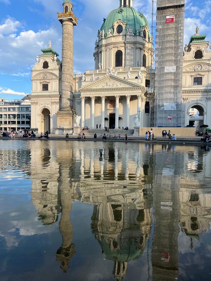 church in front of reflecting pool // old building with plants growing on it