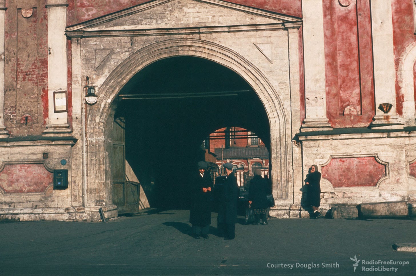 The impressive entrance to Donskoy Monastery, Moscow, inviting a glimpse into its historic grounds during the 1950s. The impressive entrance to Donskoy Monastery, Moscow, inviting a glimpse into its historic grounds during the 1950s.