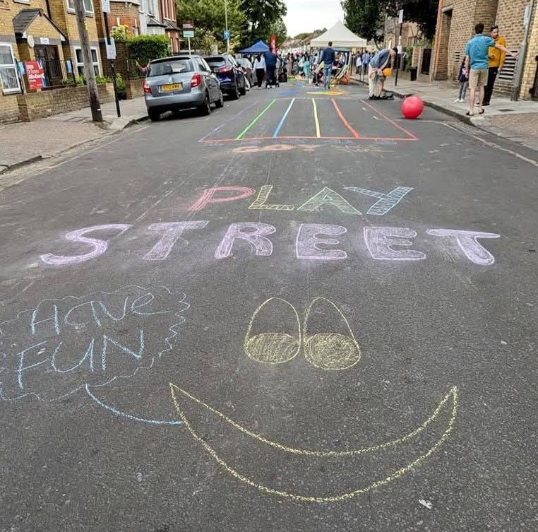 May be an image of 9 people, street and text