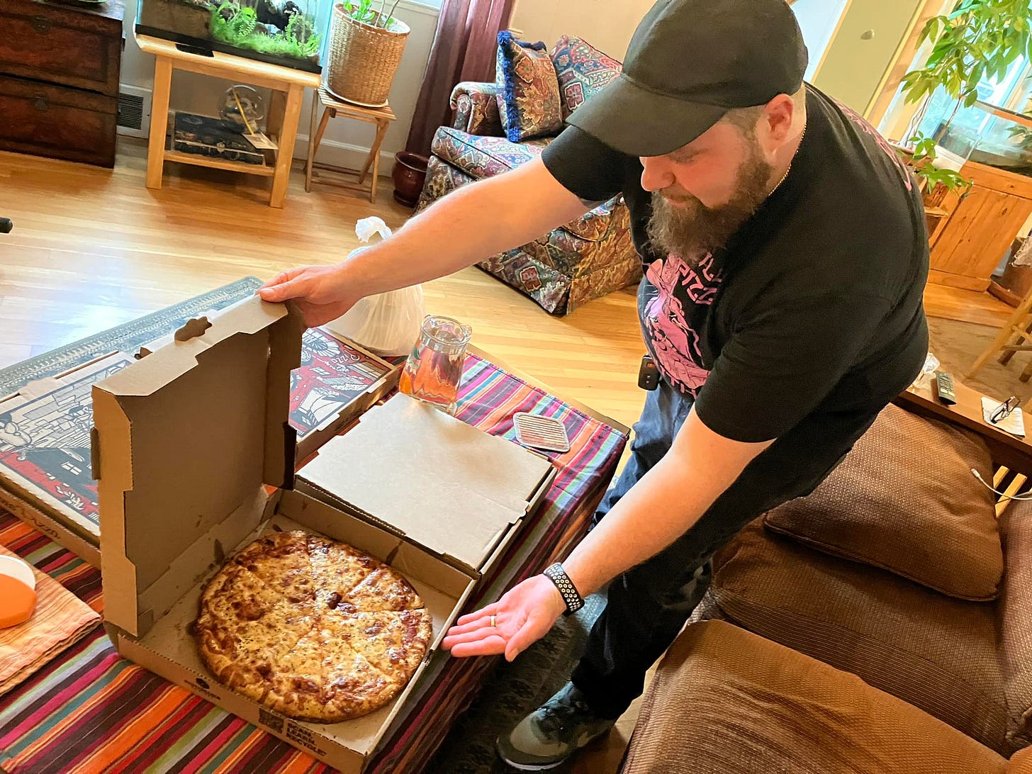 May be an image of 1 person, pizza and crumbcake