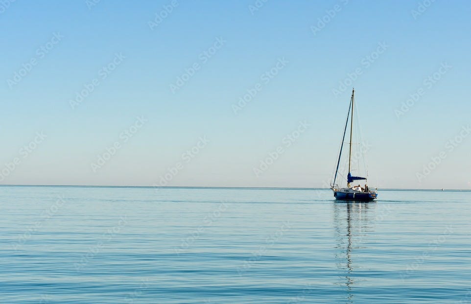 Photo Stock Voilier sur mer d'huile | Adobe Stock