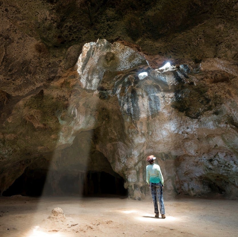Woman in Quadirikiri Cave, Arikok National Park, Aruba - Travel Off Path