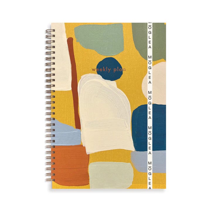 cover of a spiral bound Moglea planner cover of a spiral bound Moglea planner