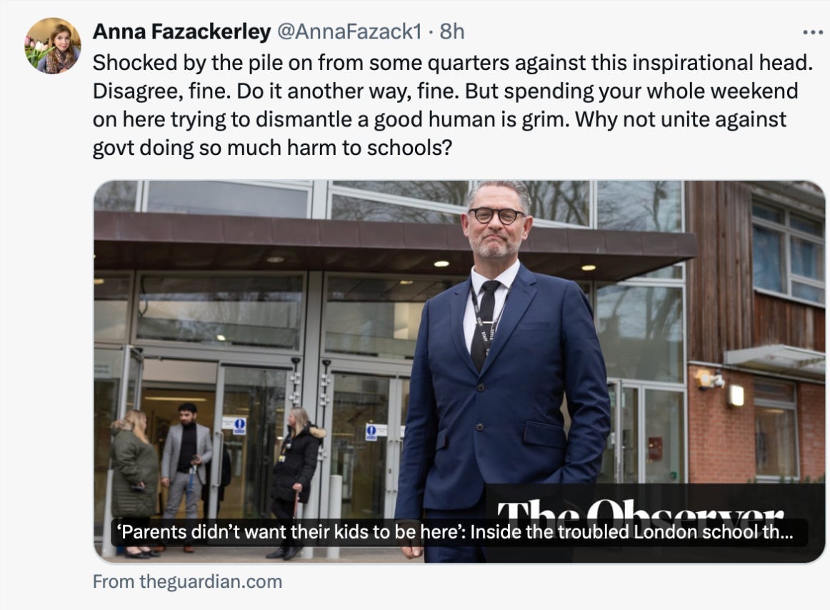 A person in a suit and tie

Description automatically generated
