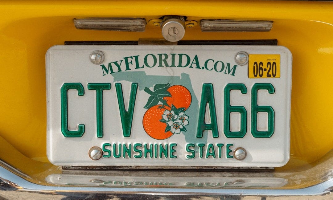 Florida license plate on a yellow car