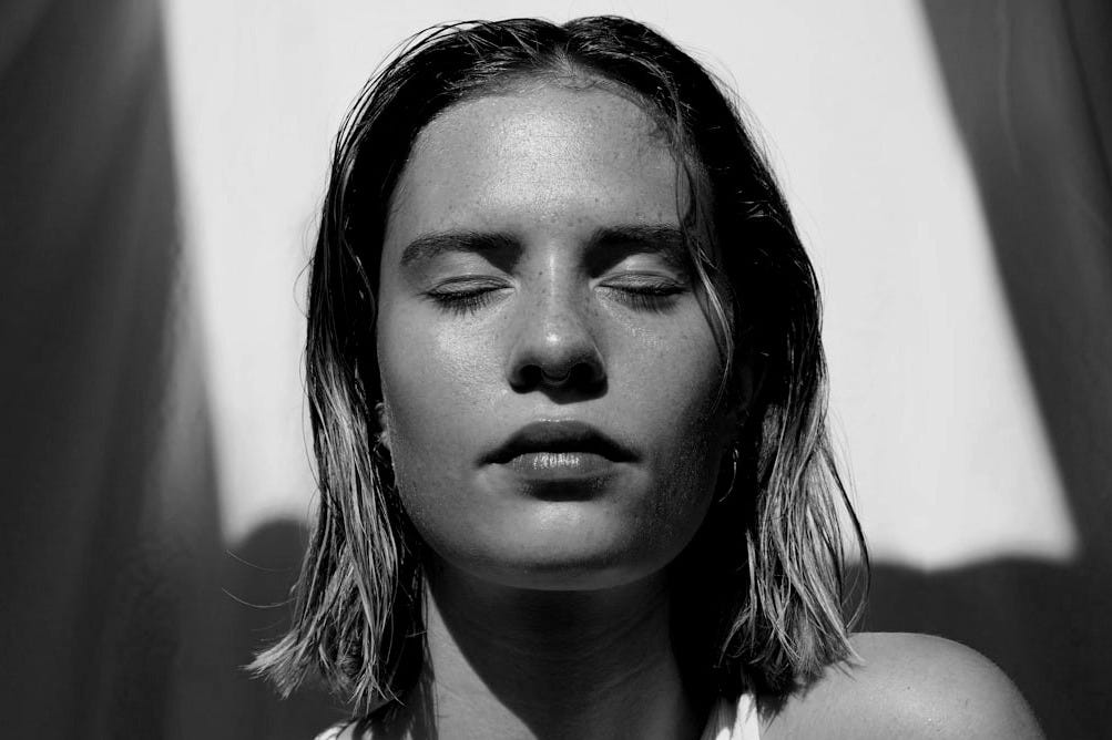 woman in white tank top