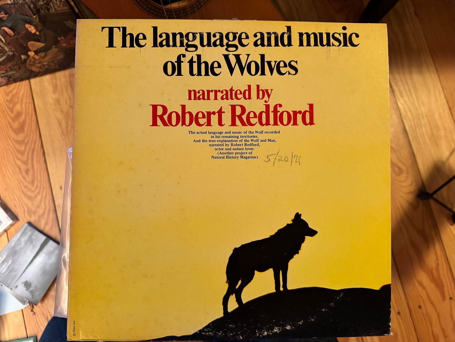 Album cover of The language and music of the Wolves, narrated by Robert Redford