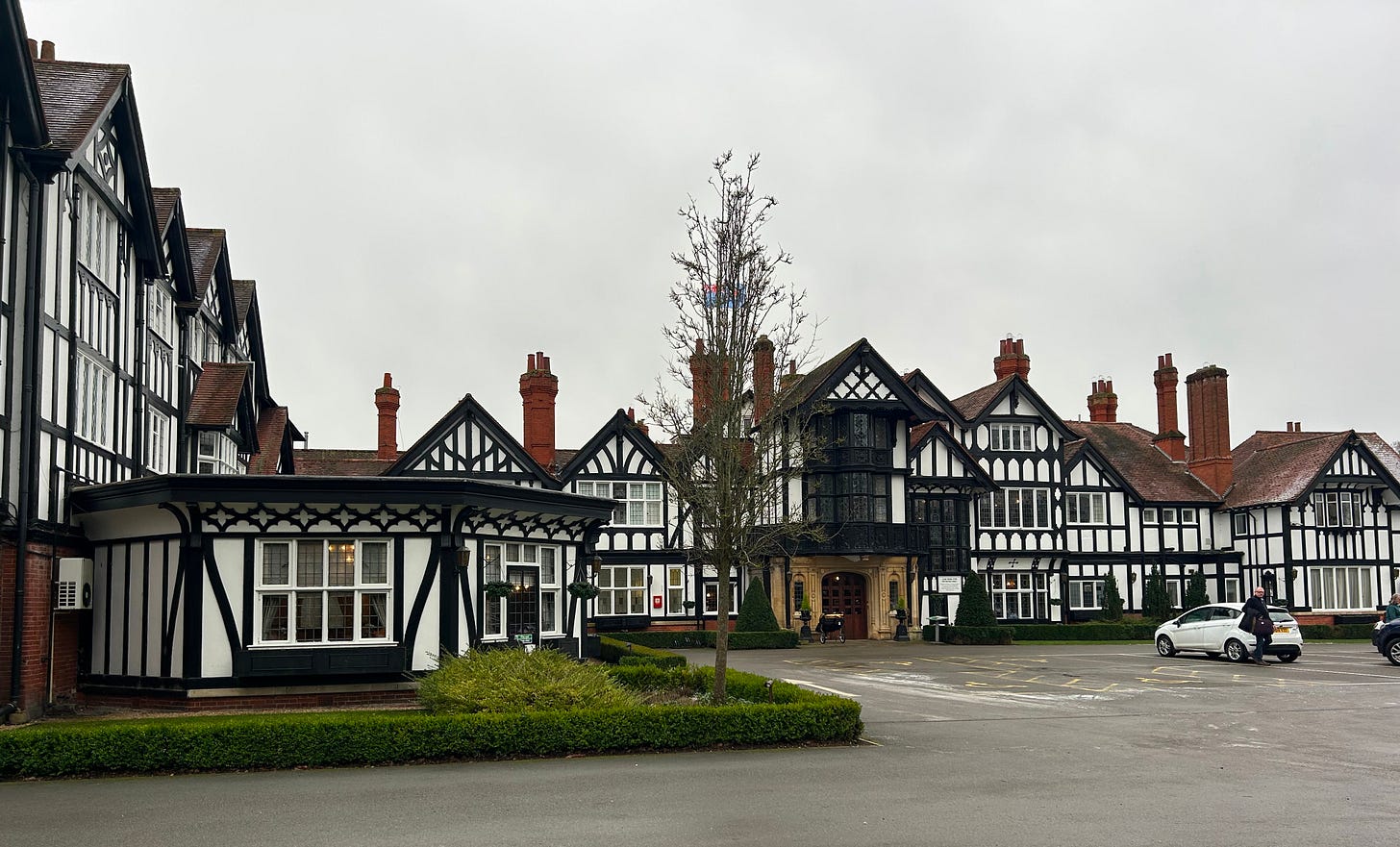 Petwood Hotel, Woodhall Spa. Viewed from the front. The black and white Tudor and Jacobean building viewed on a wet January day 2026.