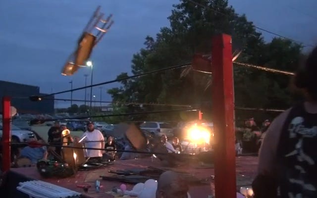 [Screenshot: Chairs fly into the ring]