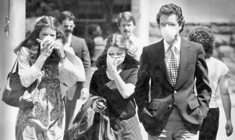 People wearing masks in Portland Oregon ahead of the 1980 eruption of Mt. St. Helens. People wearing masks in Portland Oregon ahead of the 1980 eruption of Mt. St. Helens.