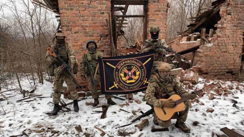 Wagner fighters in the ruins of Bakhmut