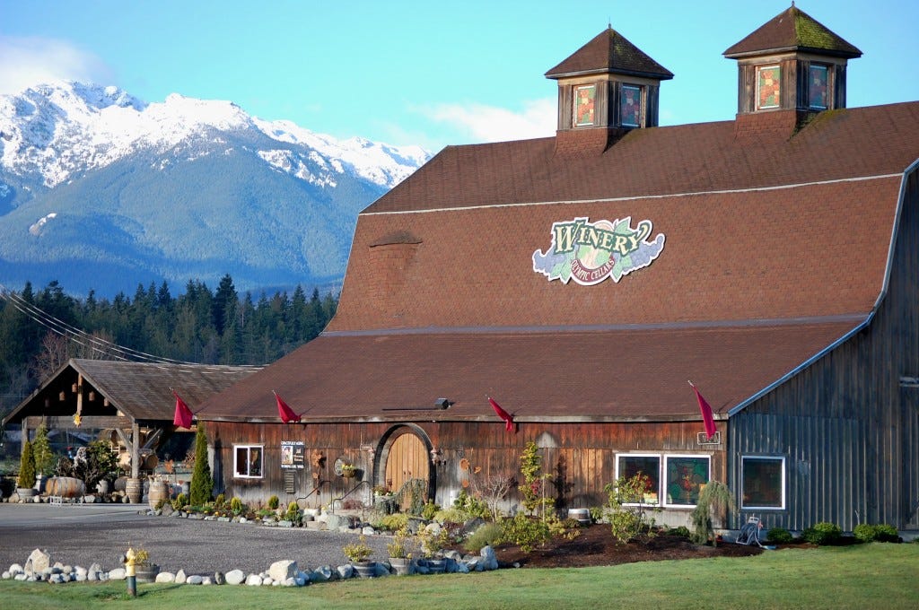 Olympic Cellars Winery near Port Angeles, Wash., features a historic barn in the shadows of the Olympic Mountains. (Photo courtesy of Olympic Cellars Winery) Olympic Cellars Winery near Port Angeles, Wash., features a historic barn in the shadows of the Olympic Mountains. (Photo courtesy of Olympic Cellars Winery)