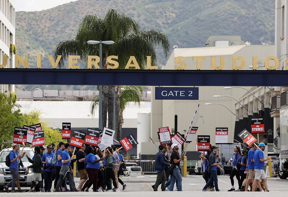 Workers and supporters of the Writers Guild of America protest outside Universal Studios Hollywood May 3, in the Universal City area of Los Angeles a day after union negotiators called a strike for film and television writers. (OSV News/Reuters/Mario Anzuoni) Workers and supporters of the Writers Guild of America protest outside Universal Studios Hollywood May 3, in the Universal City area of Los Angeles a day after union negotiators called a strike for film and television writers. (OSV News/Reuters/Mario Anzuoni)