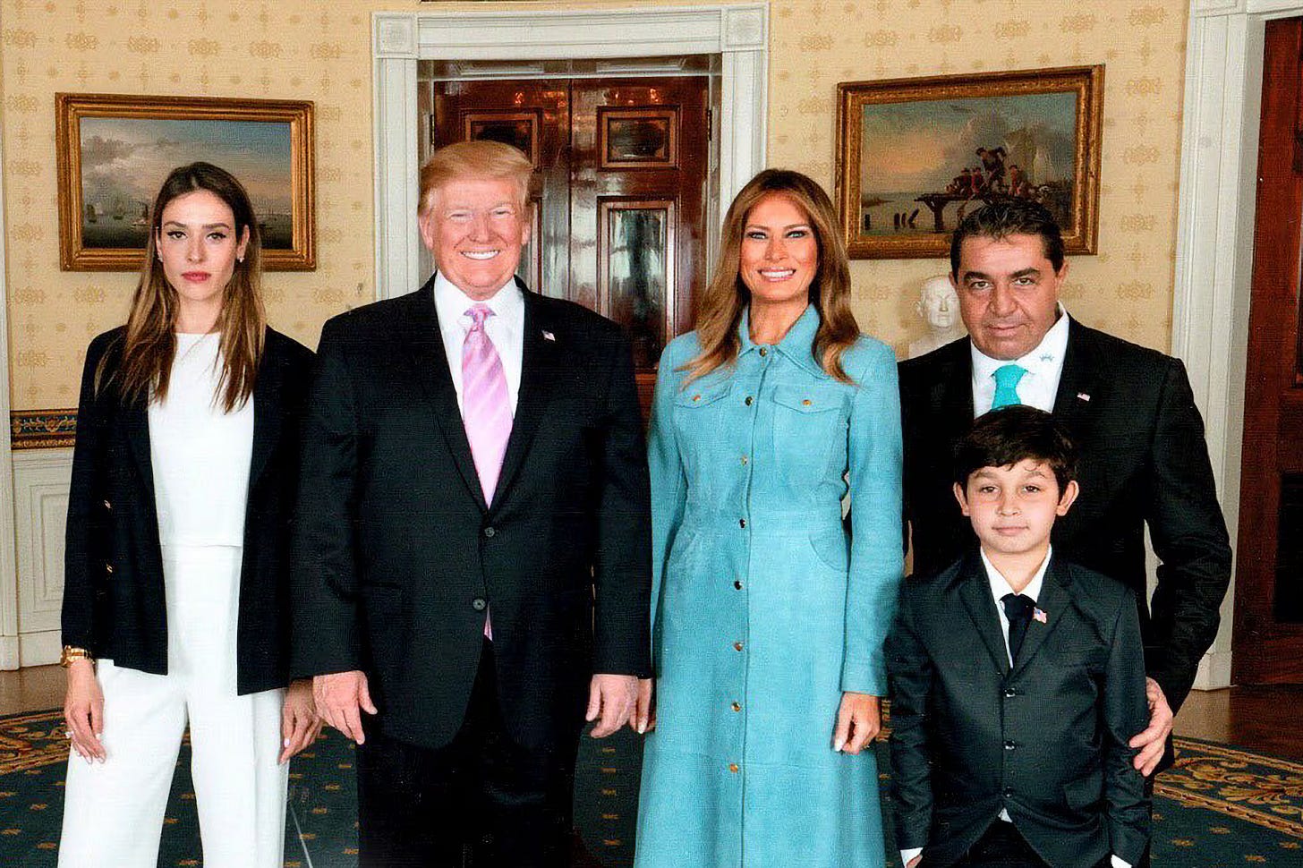 Ungaro, the Trumps, and Zampolli, along with the son over whose custody they are fighting, in a photo taken at the White House and shared by Zampolli in 2019.