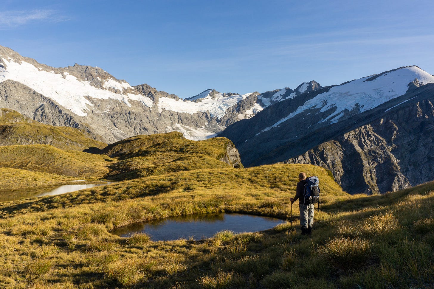 Photo of a hiker on the Cascade Saddle route in New Zealand