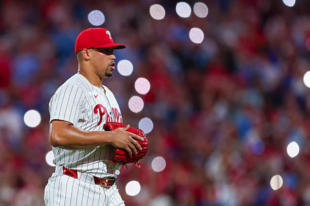 Jhoan Duran of the Philadelphia Phillies walks to the mound after his entrance from the bullpen in the ninth inning against the Seattle Mariners at...