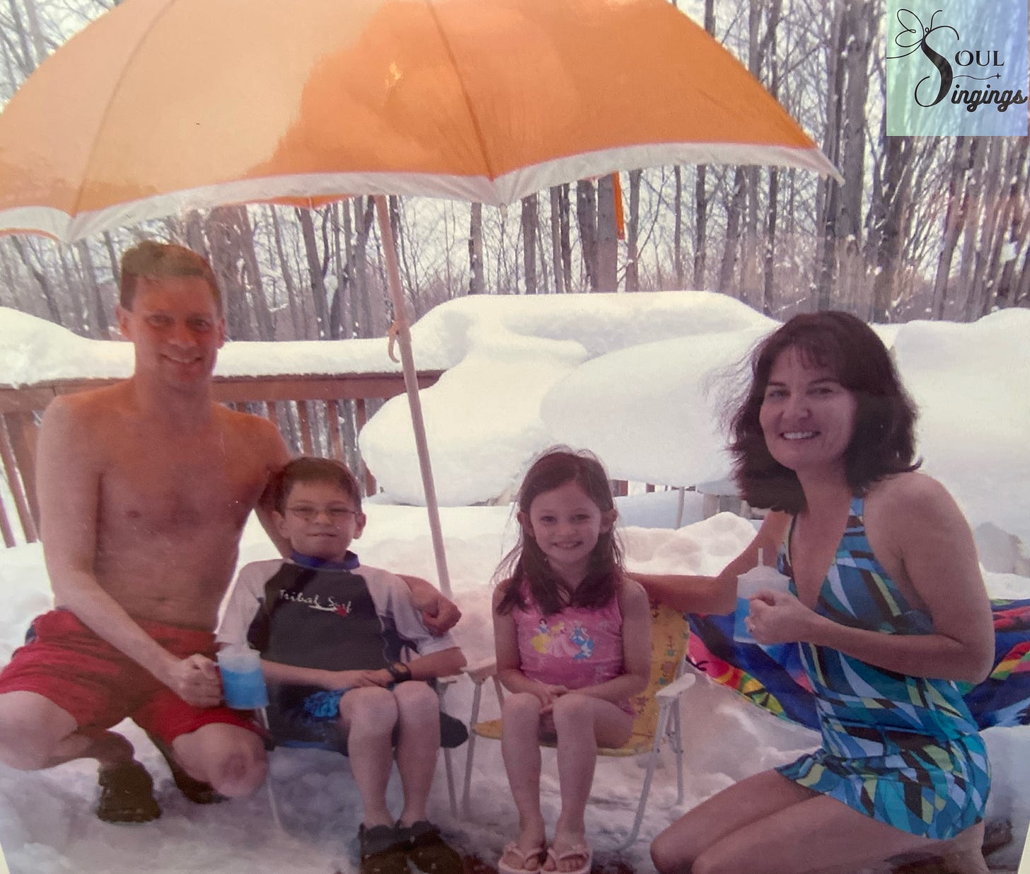 60 Things I've Learned at 60: picture of 2 parents and 2 children with beach attire on a snowy deck