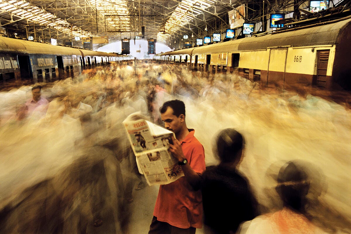 Overcrowded local trains connecting Mumbai with its suburbs. Mumbai, India. © Raghu Rai / Magnum Photos