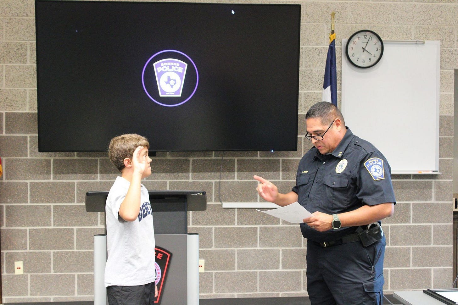 Boy heroically steers car to safety after father's medical emergency photo 1