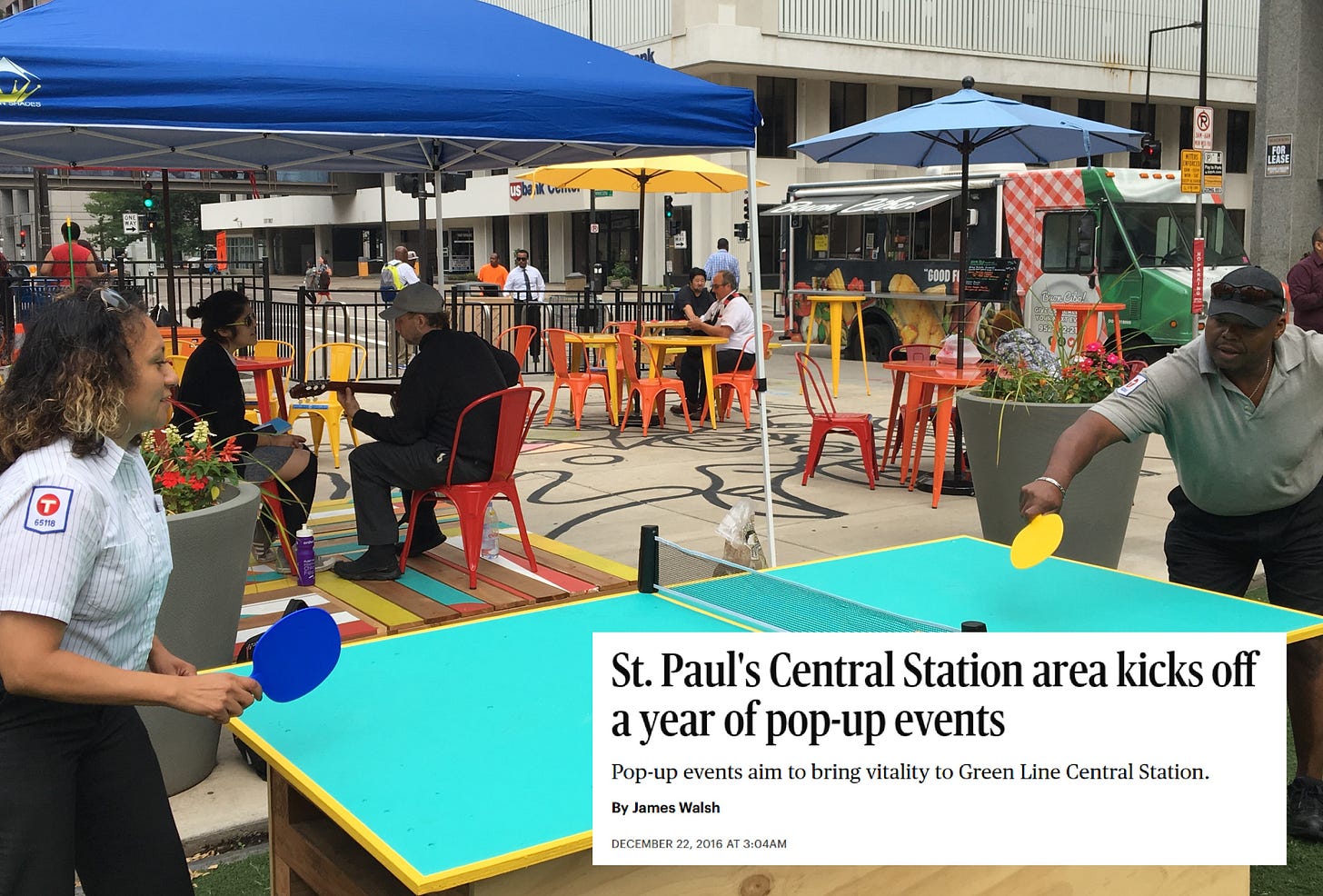 Two people play ping-pong at a pop-up event at Central Station in St. Paul. A screenshot of a headline from a news article about the popups is overlaid over the photo.