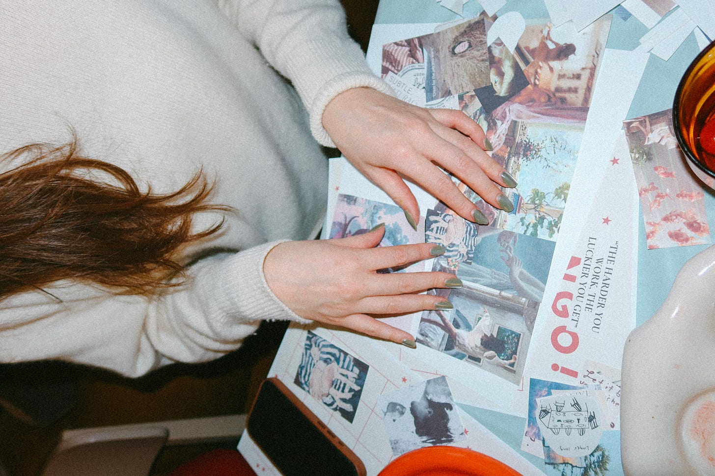 A photo of arranging collage images on a page 