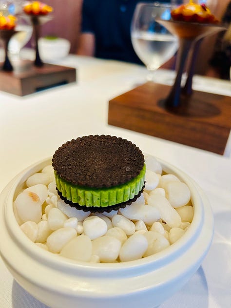 Snapshots of a tasting menu at Indienne in Chicago. Small plates with colorful food and a snapshot of the menu itself listing interesting twists on haute Indian cuisine as prepared by Chef Sujan Sukar