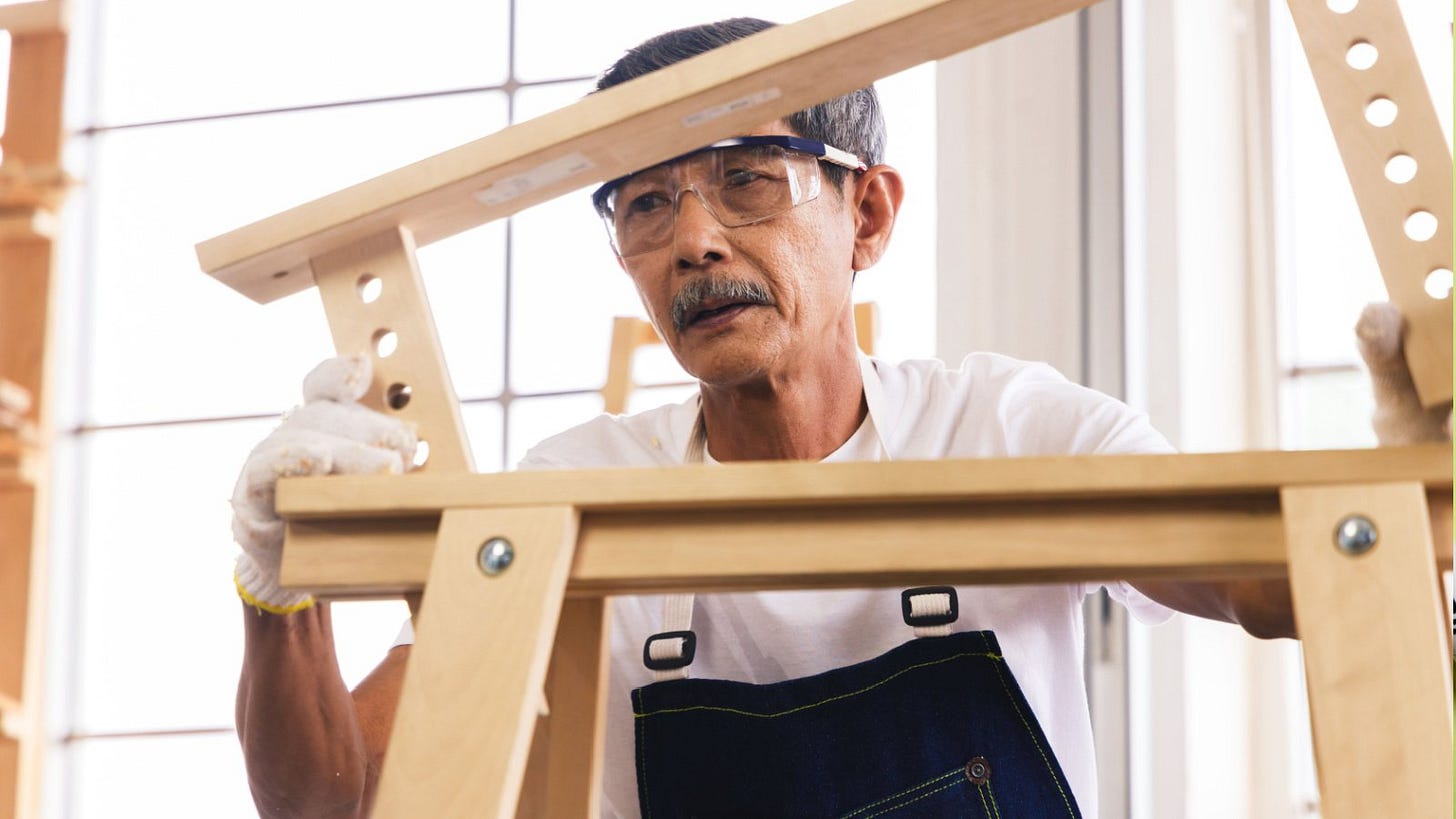retired person doing woodwork