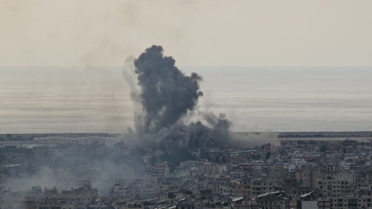 A plume of smoke aftera bombing in Beirut A plume of smoke aftera bombing in Beirut