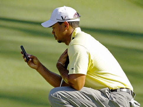 Tiger Woods whips out cell phone on Augusta greens, but not for sexts –  just advice for fellow pro – New York Daily News