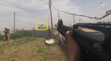ISIS operatives firing at a Popular Mobilization vehicle in the Al-Tarmiyah Province (Amaq, Telegram, April 13, 2023) ISIS operatives firing at a Popular Mobilization vehicle in the Al-Tarmiyah Province (Amaq, Telegram, April 13, 2023)