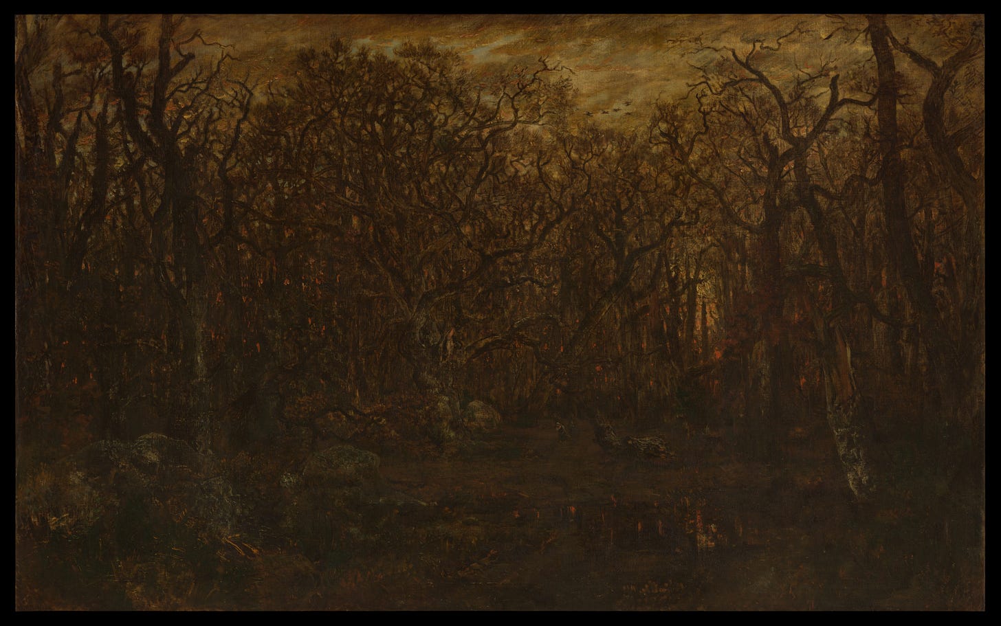 The Forest in Winter at Sunset, Théodore Rousseau (French, Paris 1812–1867 Barbizon), Oil on canvas. A dark brown-toned painting of a forest, with a light brown sky and a bit of orange in the right, which can be glimpsed through the trees. Two small figures wearing white are walking through the landscape.