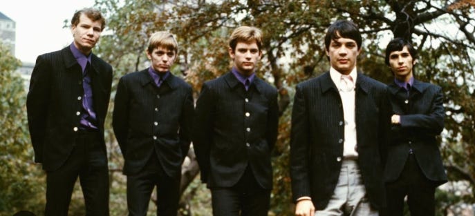 A group of men in suits

AI-generated content may be incorrect.