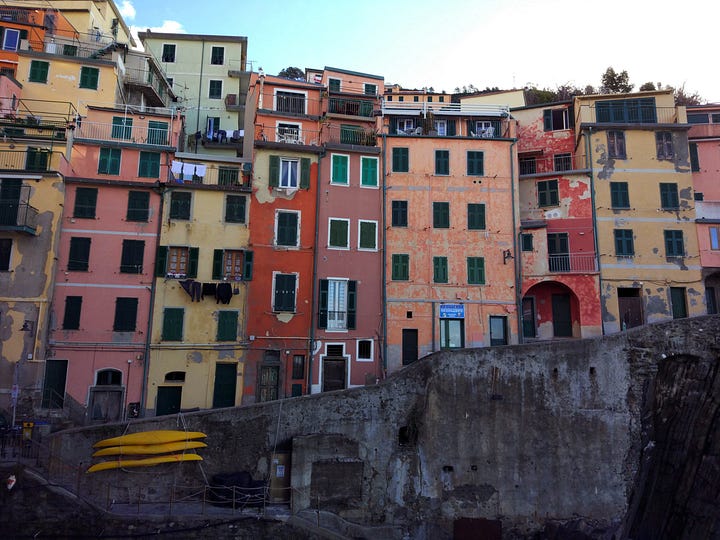 Two views of the colorful houses of Riomaggiore.