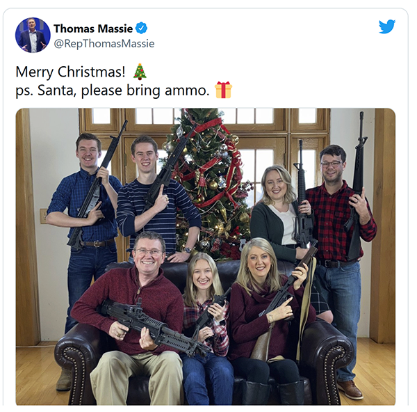 Screenshot from Massie's Apartheid Twitter account. His family, including teenage progeny, are all holding weapons of war.