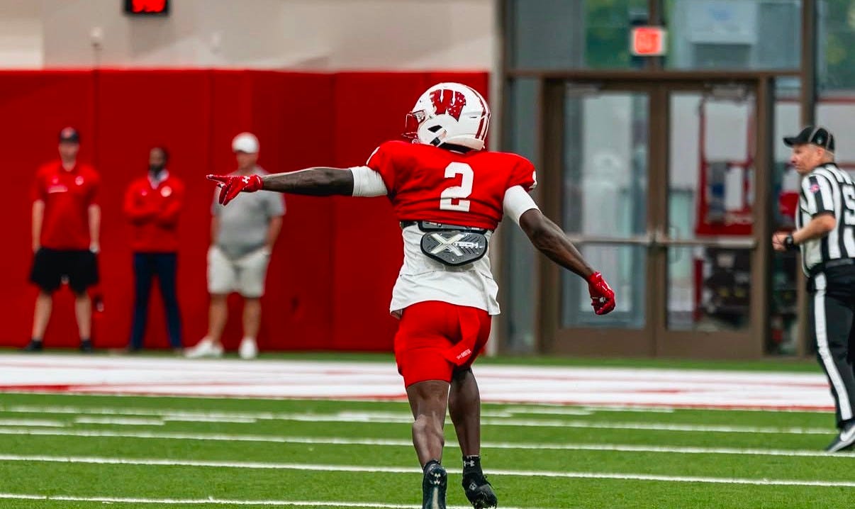 Wisconsin Badgers cornerback Javan Robinson runs during a drill inside the new indoor practice facility.