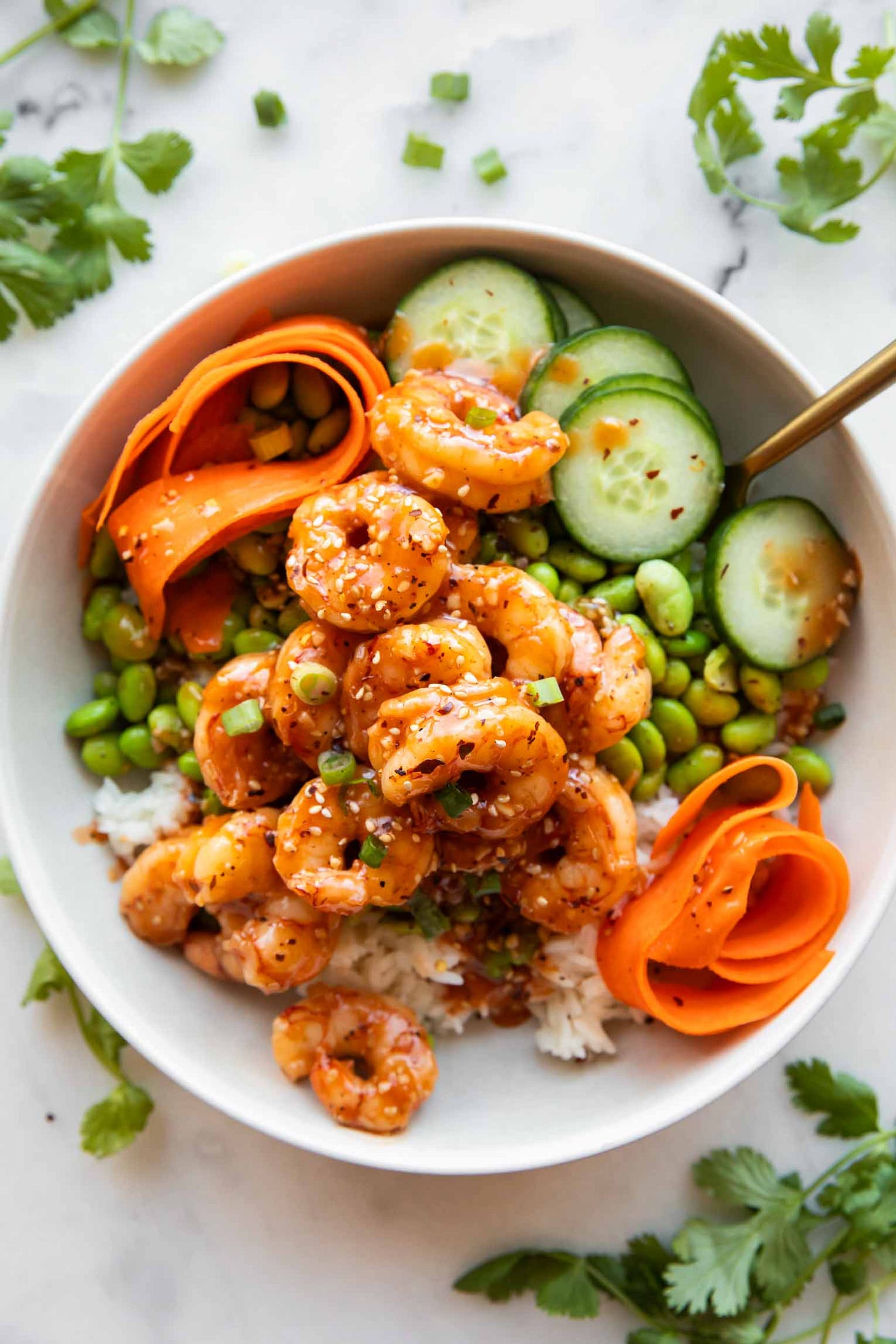 Sticky Garlic Sesame Shrimp in a bowl.
